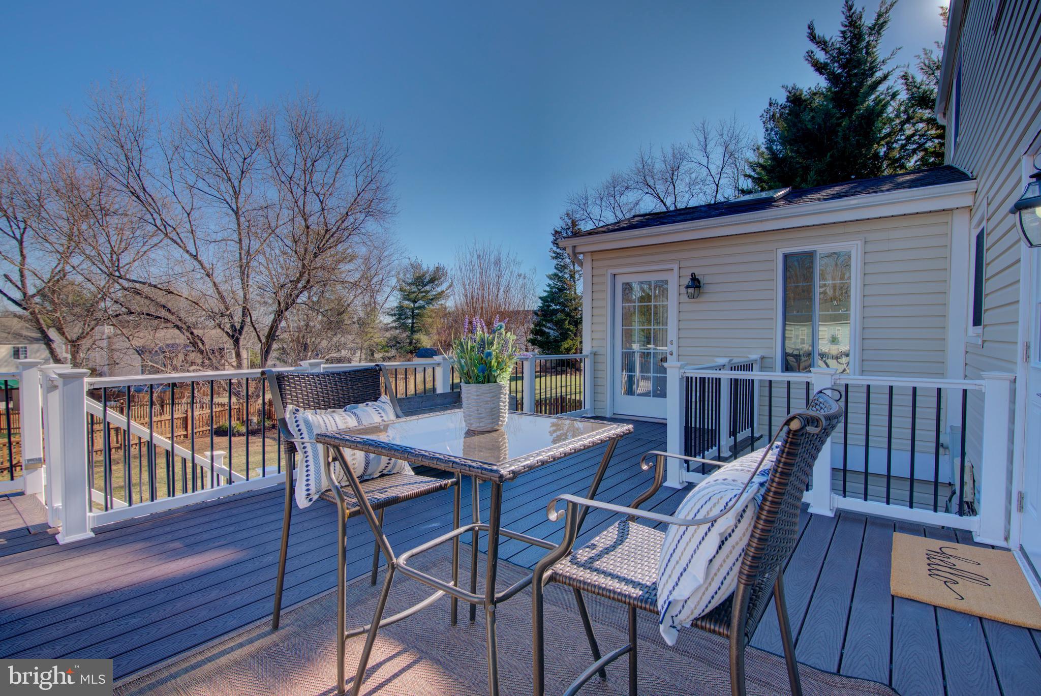 304 Aaron Court Sterling, VA 20164 - Photo 14 of 28 Trex Deck w/Dual Entry from Family Room & Sunroom.