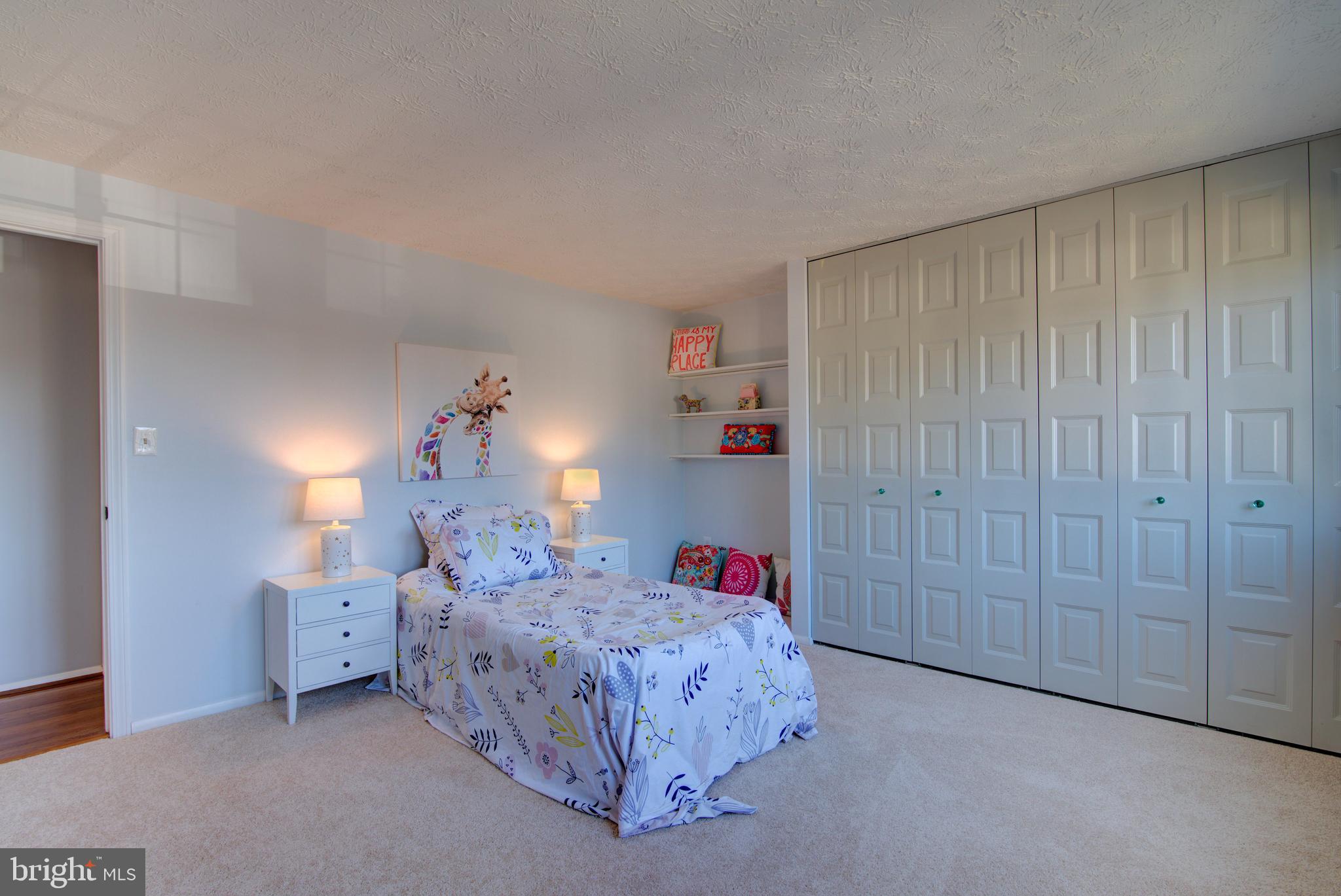 304 Aaron Court Sterling, VA 20164 - Photo 22 of 28 Upper Level Bedroom #3 w/Built-Ins, Large Closet.