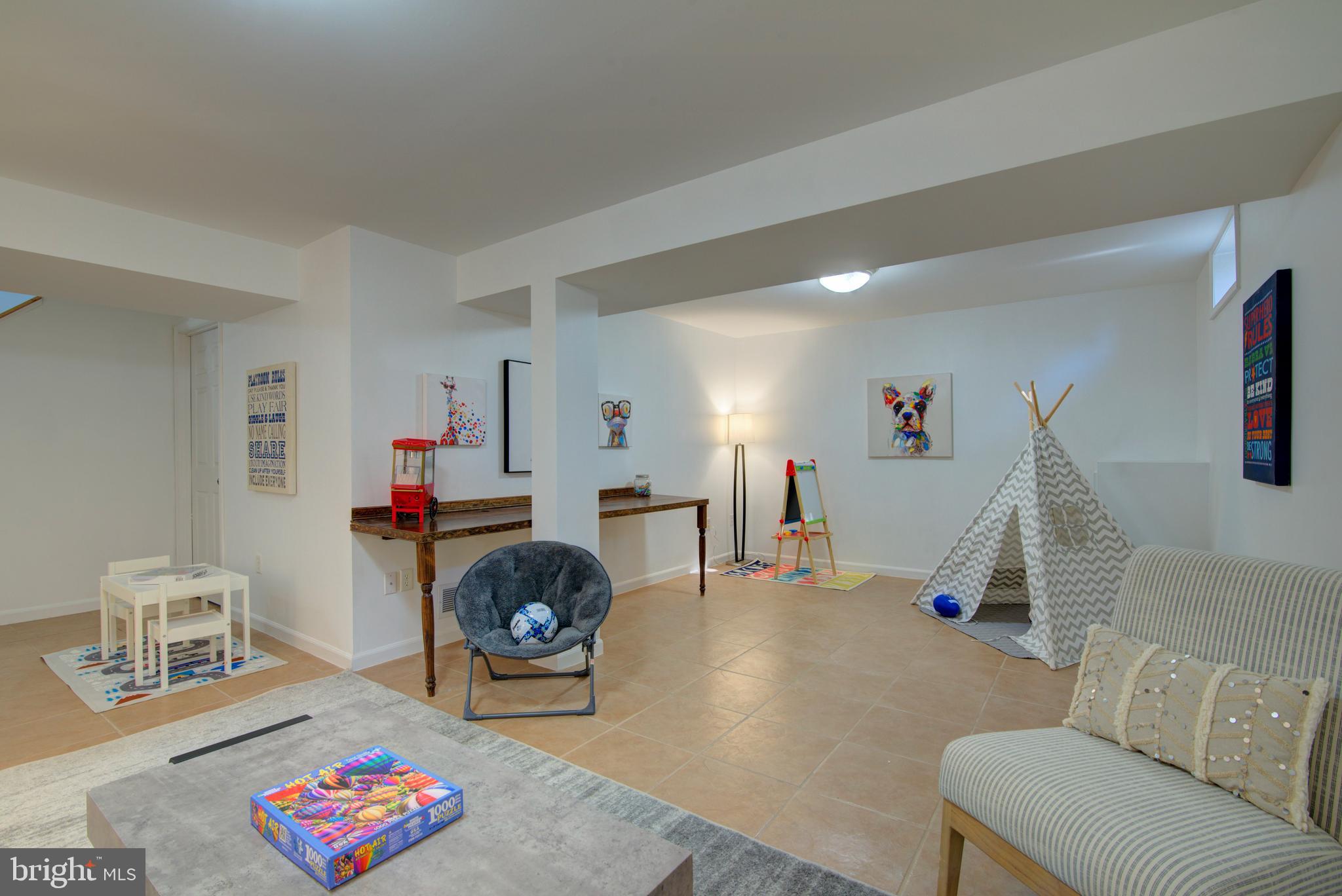 304 Aaron Court Sterling, VA 20164 - Photo 24 of 28 Lower Level Recreation Room: Game Playing/Crafts.