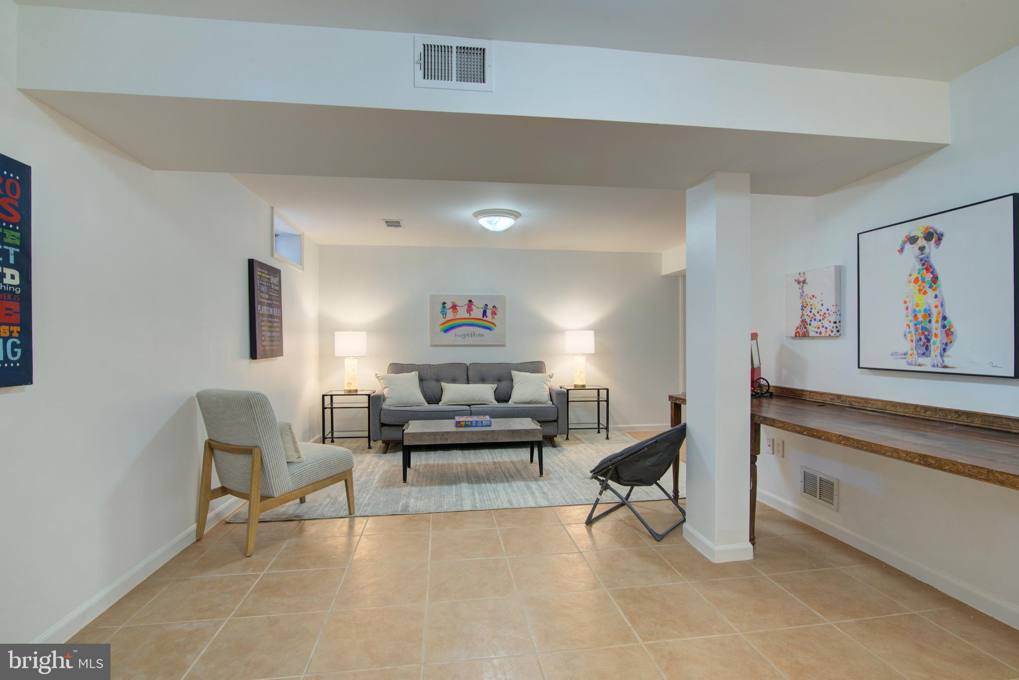 304 Aaron Court Sterling, VA 20164 - Photo 25 of 28 Lower Level: Spaces for TV Watching, Activities.