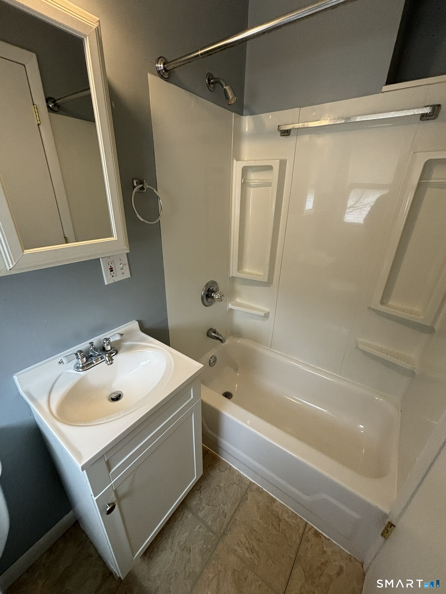 11 Roberts Street, Unit 3 Bristol, CT 06010 - Photo 9 of 11 a bathroom with a sink and a bathtub
