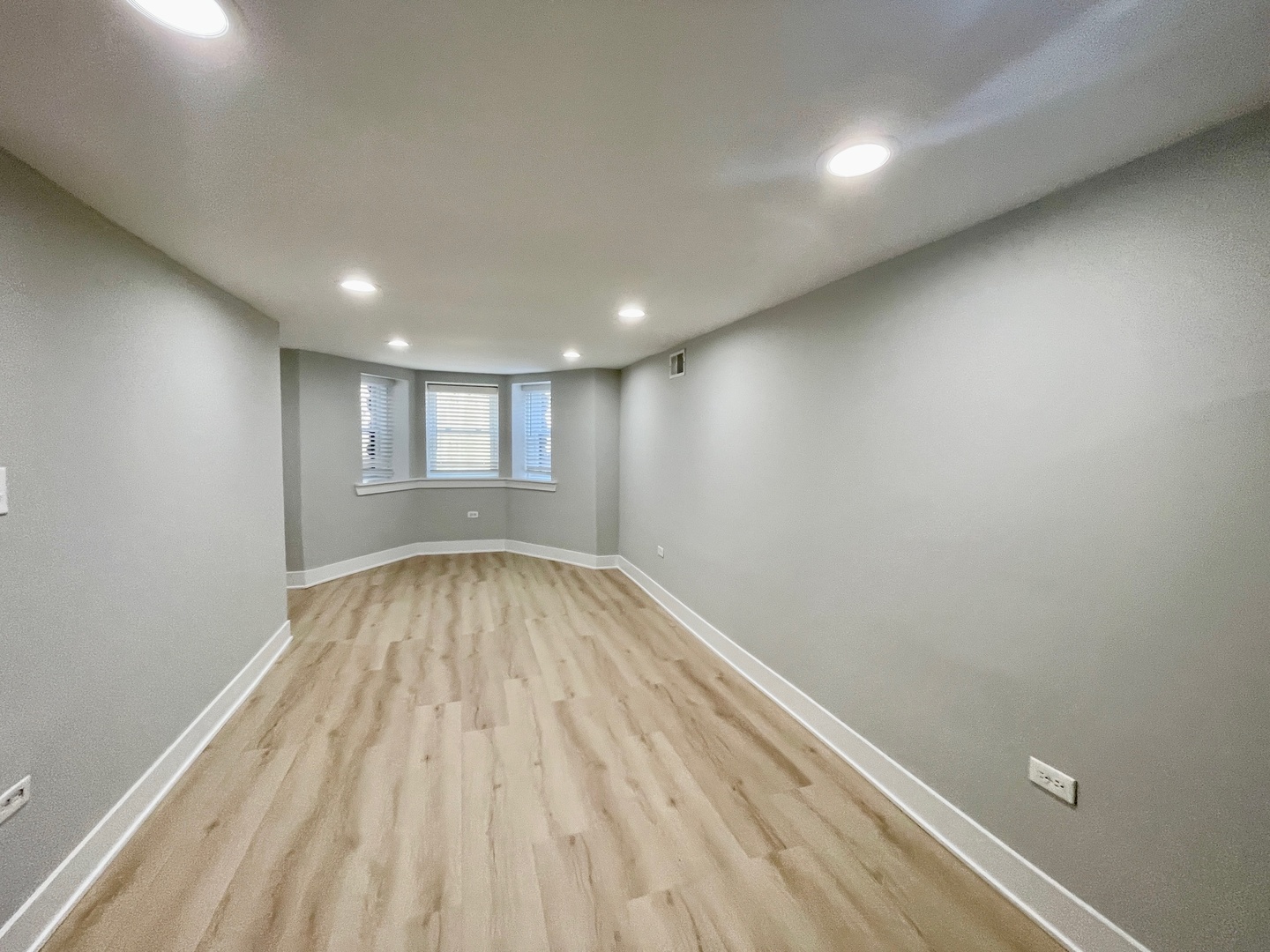 2239 West 19th Street, Unit G Chicago, IL 60608 - Photo 4 of 17 a view of empty room with wooden floor