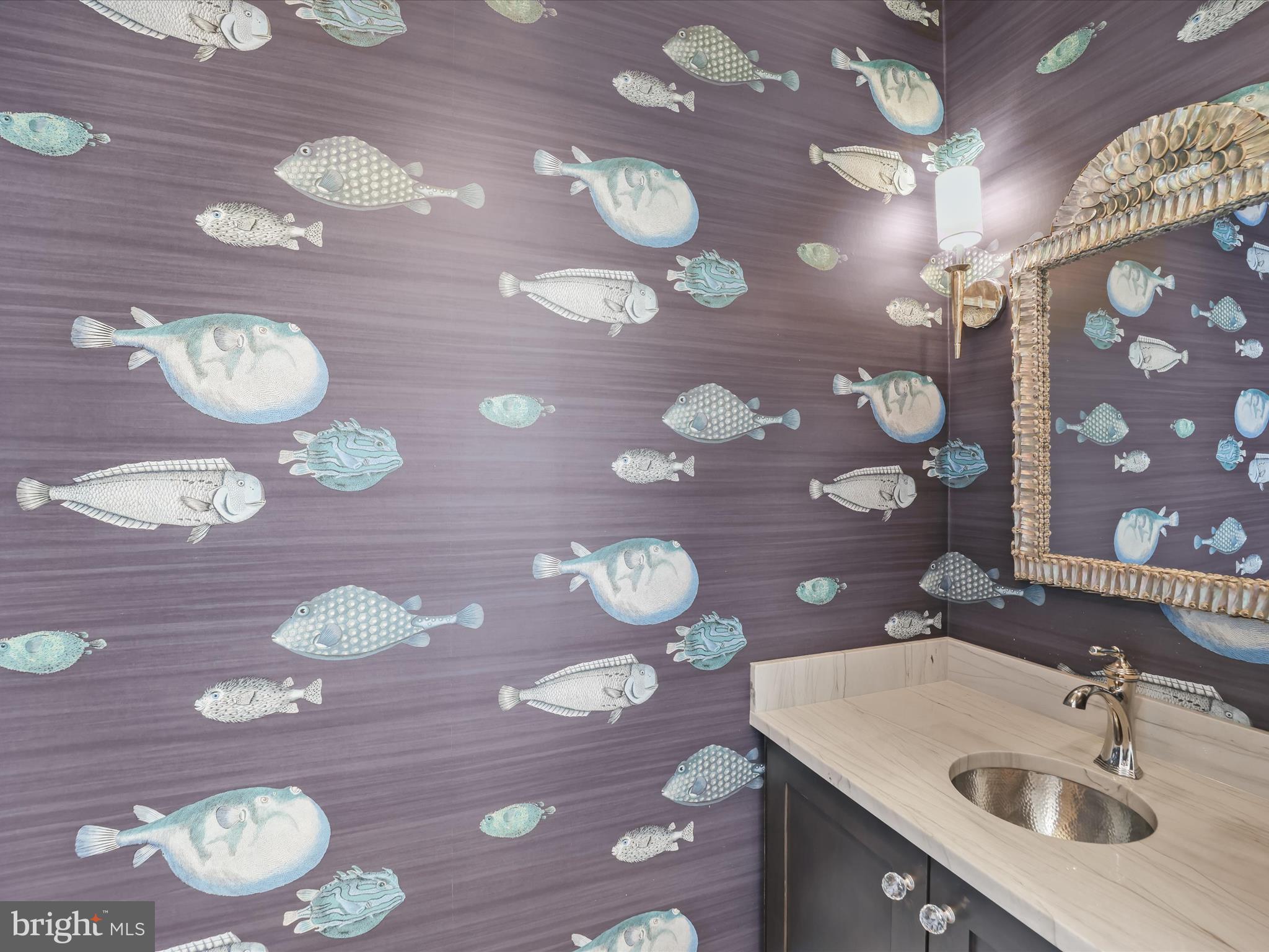 628 Ayrlie Water Road Gibson Island, MD 21056 - Photo 25 of 57 Half bath with fish wall paper and metal sink