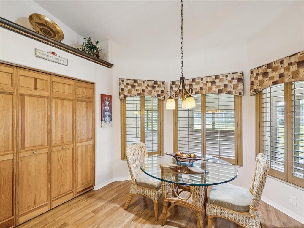 8401 Pavilion Drive Hudson, FL 34667 - Photo 20 of 81 a view of a dining room with furniture window and outside view