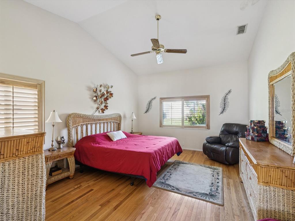 8401 Pavilion Drive Hudson, FL 34667 - Photo 21 of 81 a bedroom with two beds and a window