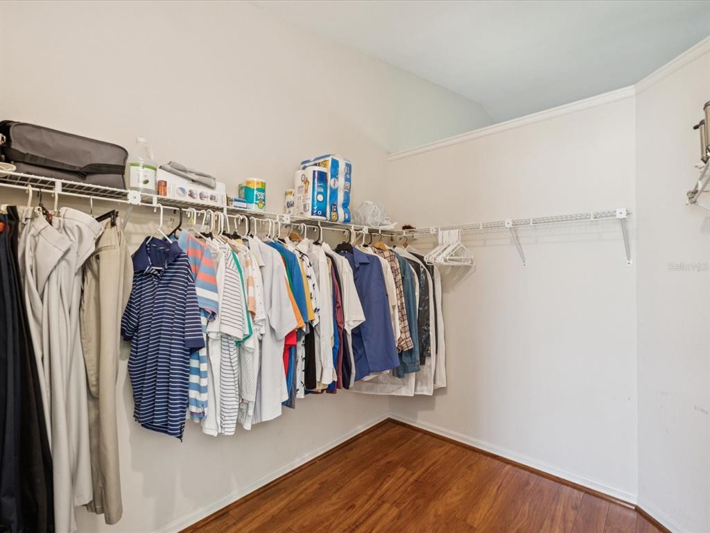 8401 Pavilion Drive Hudson, FL 34667 - Photo 23 of 81 a view of walk in closet with clothes and shoes