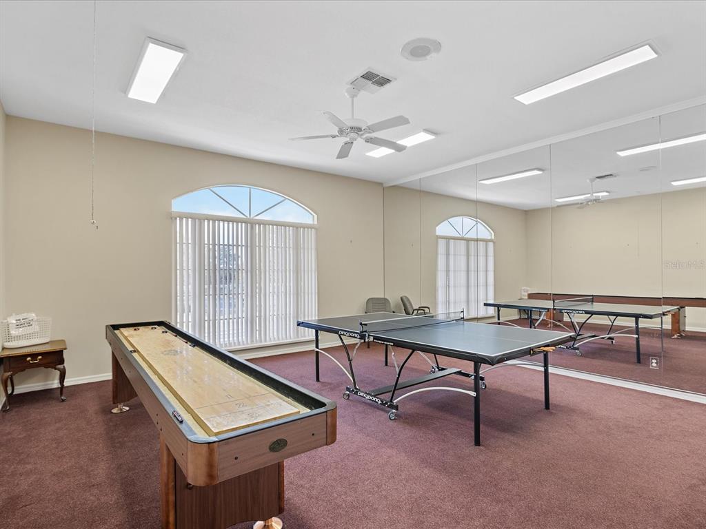 8401 Pavilion Drive Hudson, FL 34667 - Photo 63 of 81 a room with furniture pool table and windows