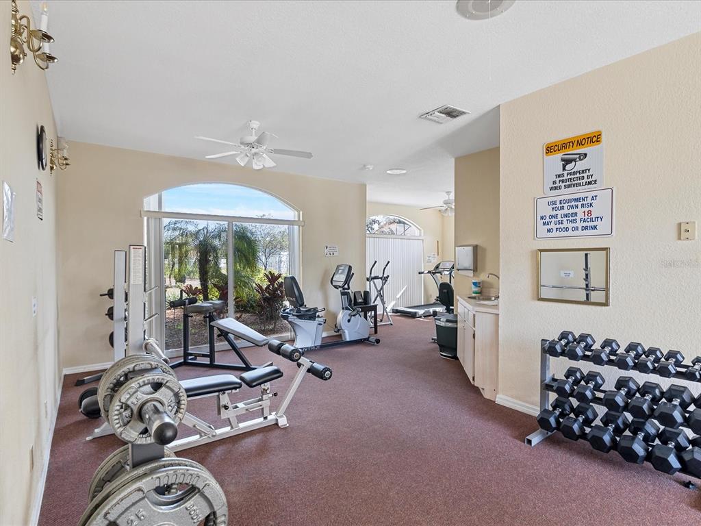 8401 Pavilion Drive Hudson, FL 34667 - Photo 64 of 81 a view of a room with gym equipment
