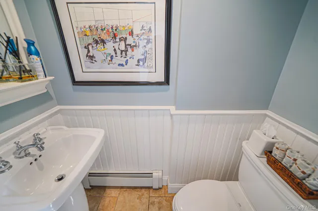 a bathroom with a sink and toilet