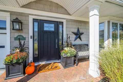 a view of a entryway door front of house