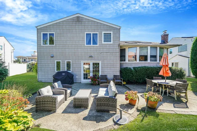 a backyard of a house with seating space