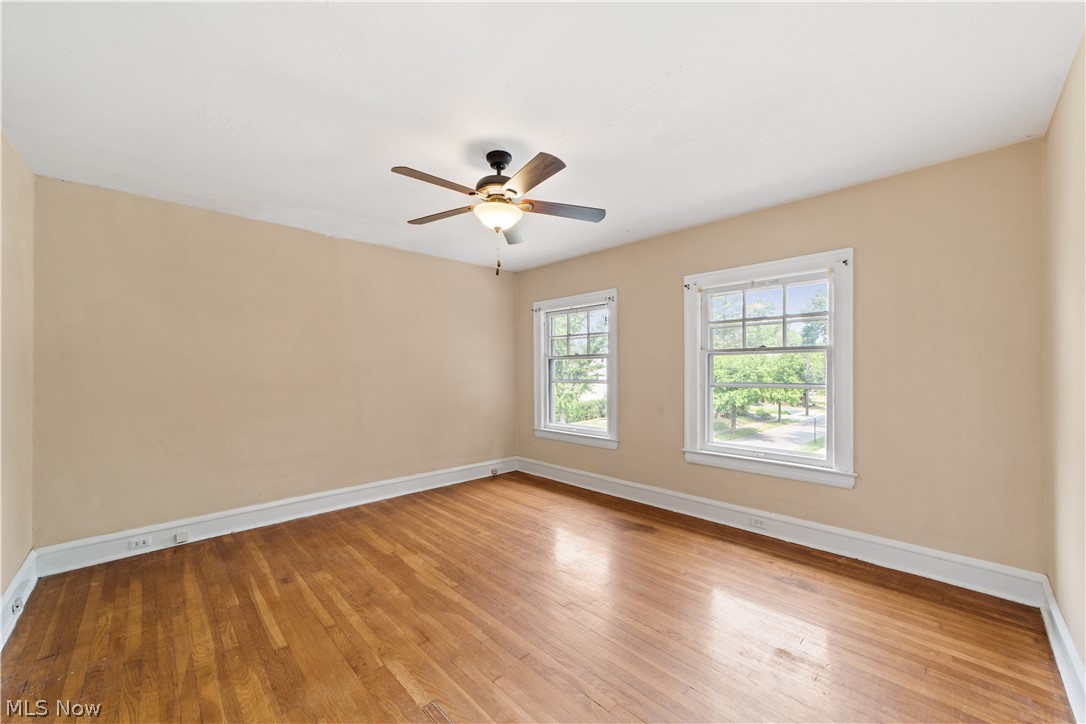 3076 Yorkshire Road Cleveland, OH 44118 - Photo 16 of 47 Spare room featuring ceiling fan and hardwood / wood-style floors