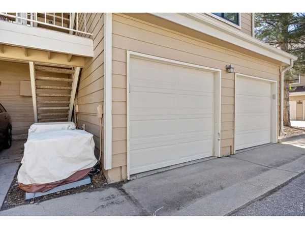 a view of wooden door and entryway