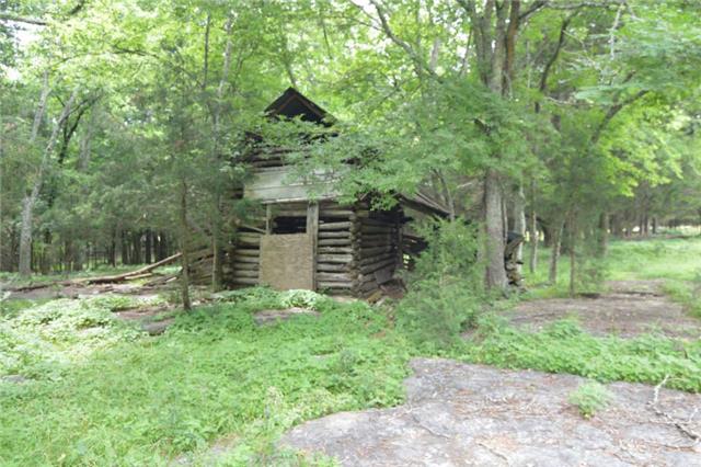 1820 Fellowship Road Mount Juliet, TN 37122 - Photo 11 of 11 Old log building back in the woods reveals more character of this old homeplace