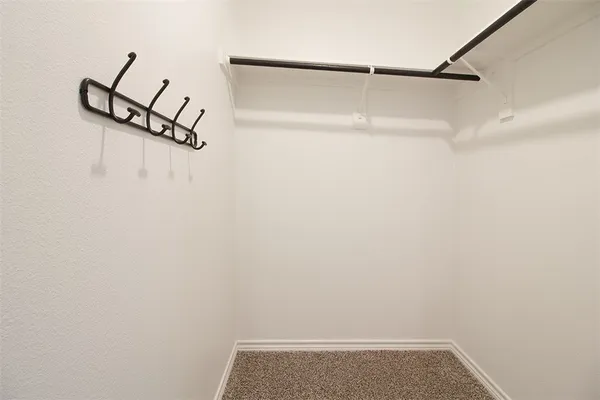 a view of a room with racks on the wall