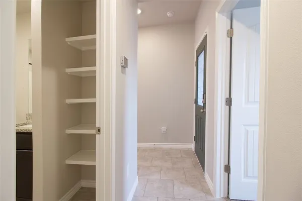 a view of a bathroom with a glass door