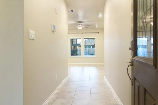 a view of a bathroom with a bathtub