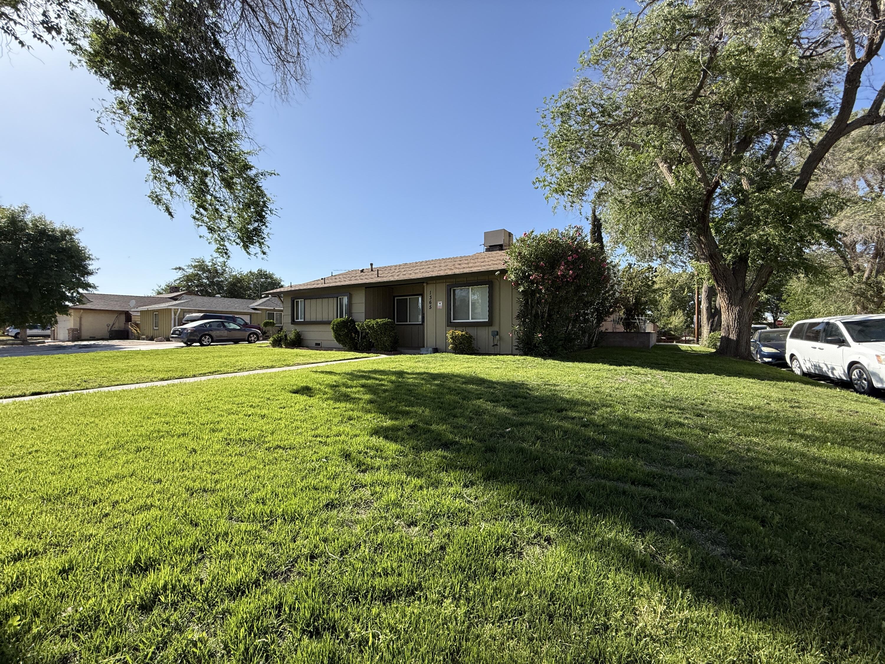 a view of a house with a big yard