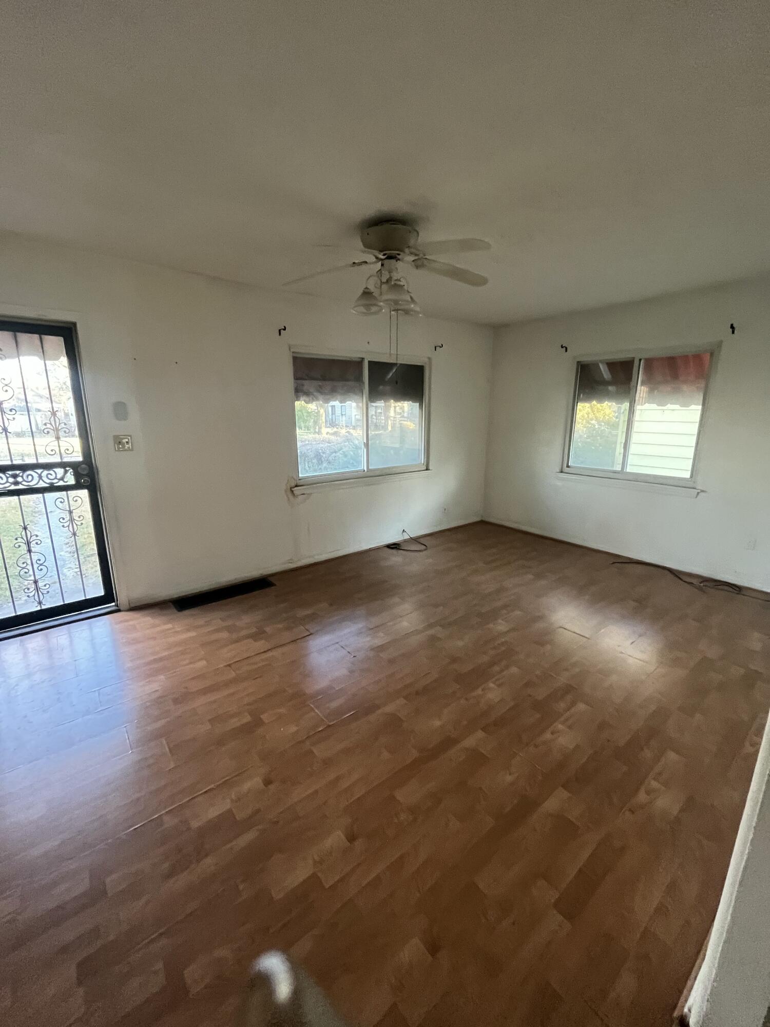 336 West Wilson Street Gary, IN 46404 - Photo 13 of 15 an empty room with windows and fireplace