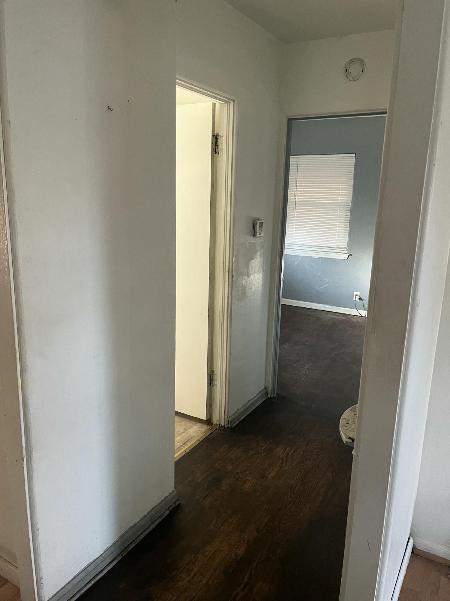 336 West Wilson Street Gary, IN 46404 - Photo 15 of 15 a view of a hallway with wooden floor