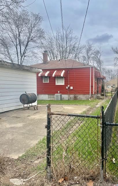 336 West Wilson Street Gary, IN 46404 - Photo 2 of 15 a front view of a house with a yard