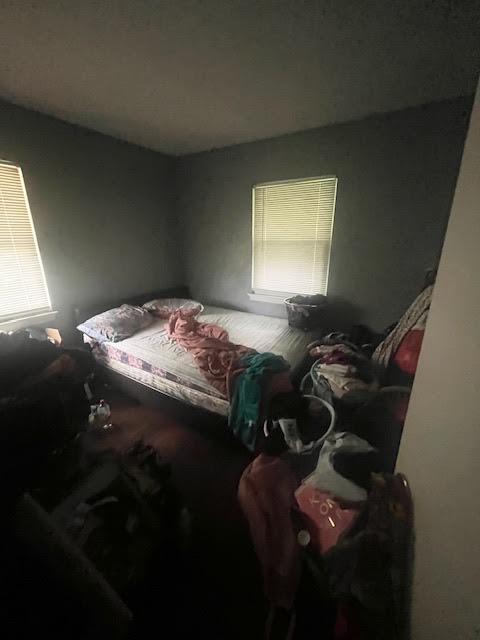 336 West Wilson Street Gary, IN 46404 - Photo 5 of 15 a bedroom with a bed and a window