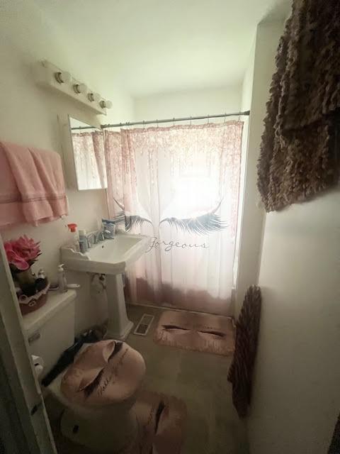 336 West Wilson Street Gary, IN 46404 - Photo 6 of 15 a bathroom with a sink toilet and shower