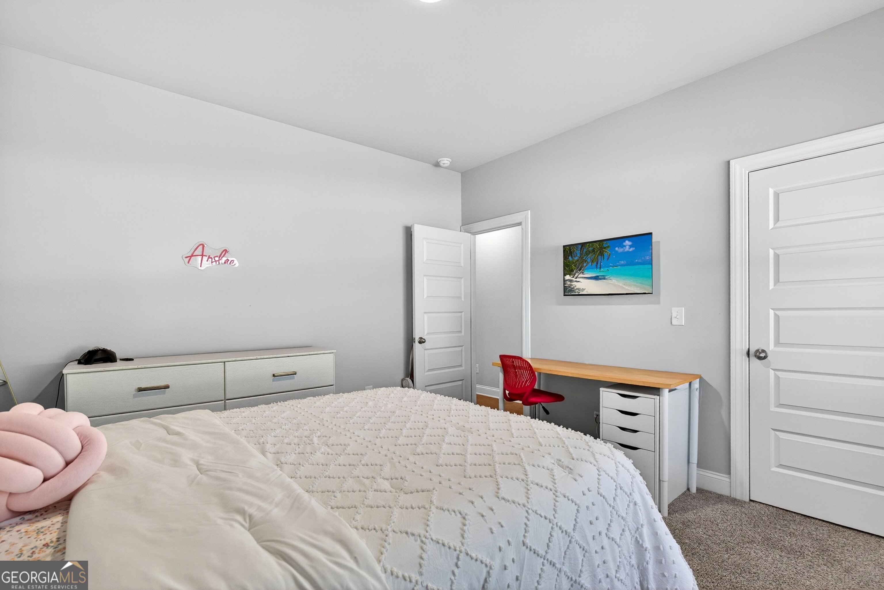 1764 Luther Bailey Road Senoia, GA 30276 - Photo 27 of 63 a bedroom with a bed and a closet