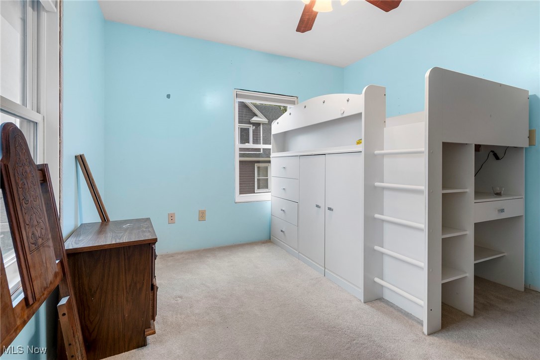 6453 Waterloo Road Atwater, OH 44201 - Photo 18 of 24 Unfurnished bedroom featuring light carpet and a ceiling fan