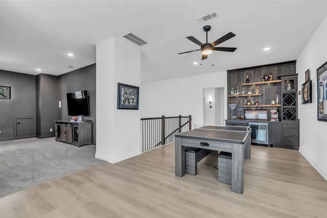 a room with furniture and wooden floor