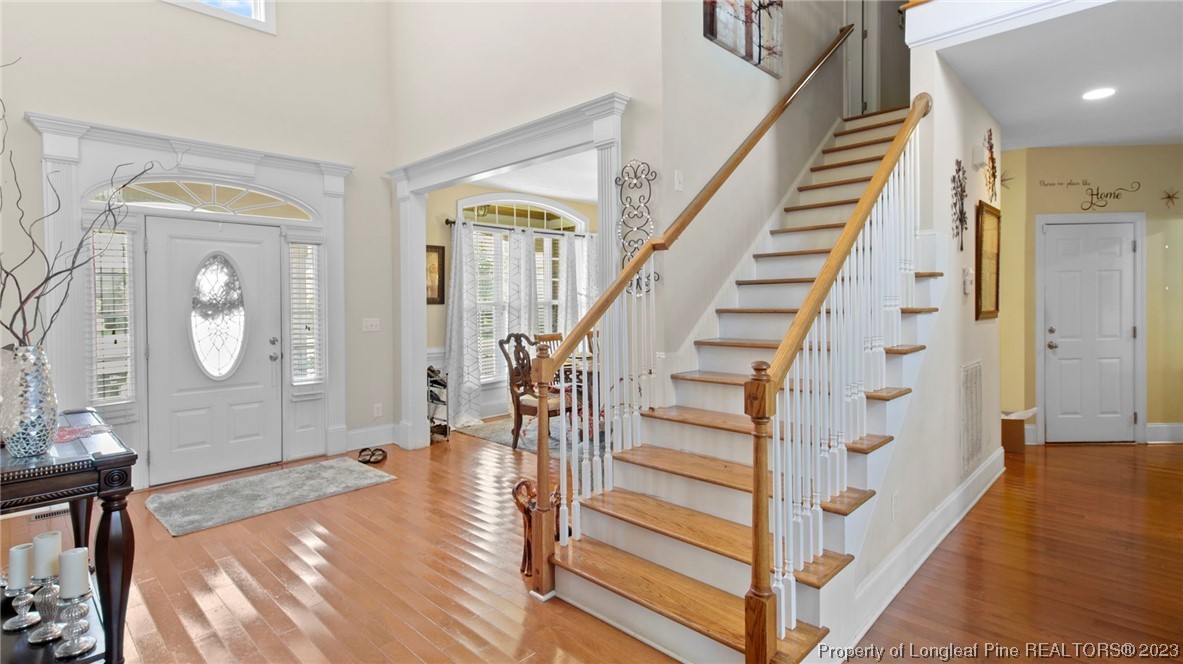 517 St Thomas Road Fayetteville, NC 28311 - Photo 7 of 47 a view of entryway and hall with wooden floor