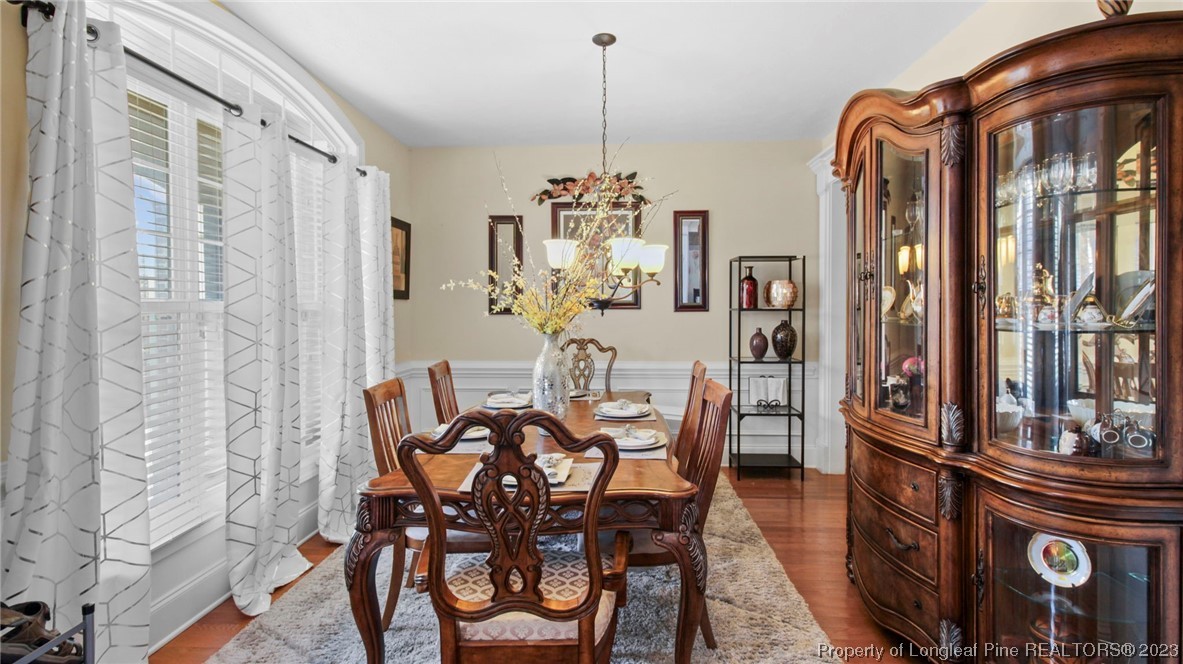 517 St Thomas Road Fayetteville, NC 28311 - Photo 8 of 47 a dining room with furniture and window