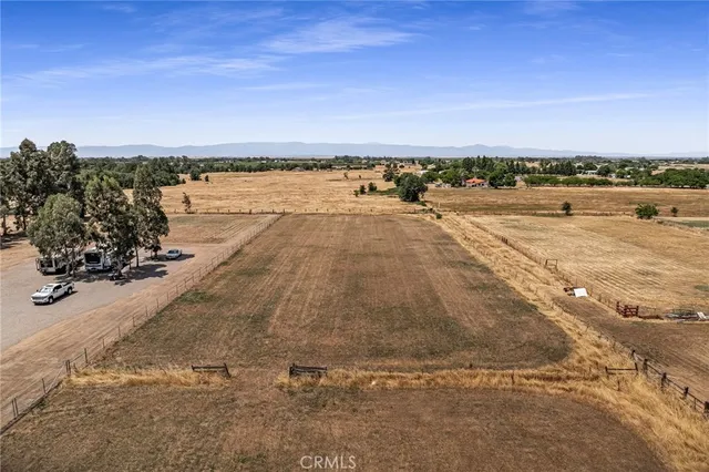 a view of an ocean beach and city
