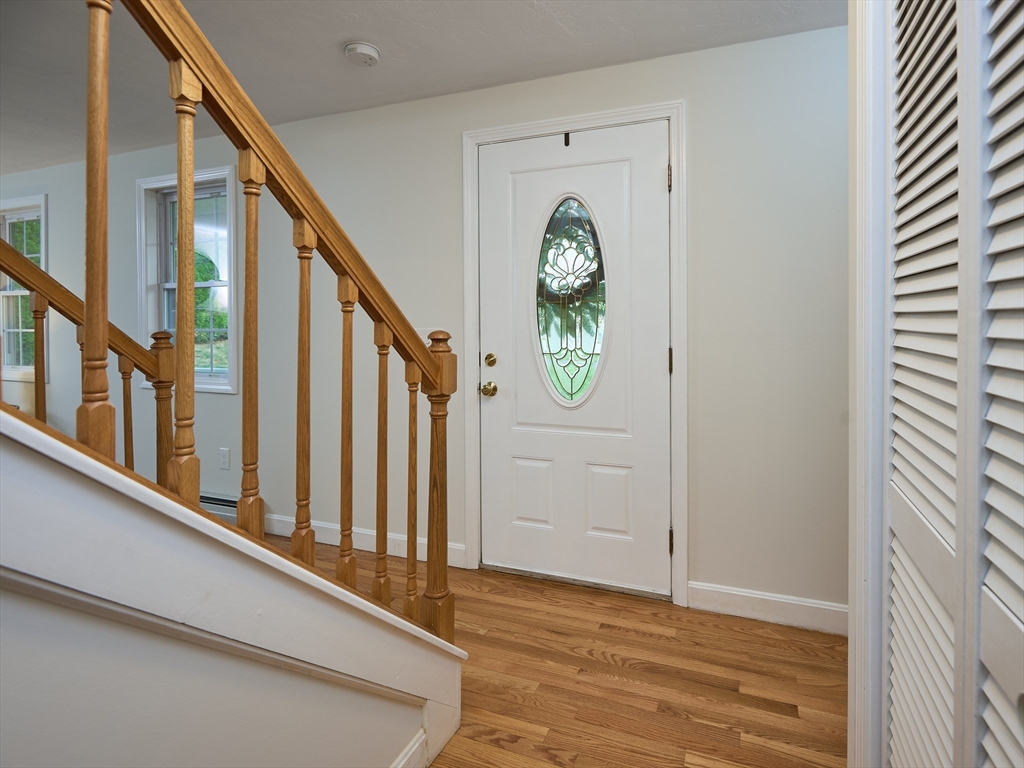 33 Wrentham Road Worcester, MA 01602 - Photo 16 of 42 wooden floor with a window