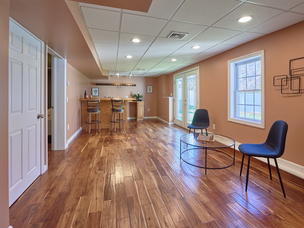 33 Wrentham Road Worcester, MA 01602 - Photo 31 of 42 a living room with furniture and a wooden floor