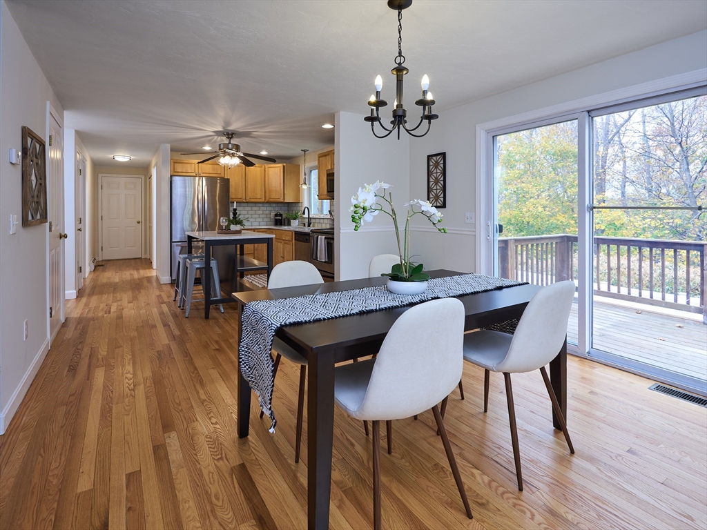 33 Wrentham Road Worcester, MA 01602 - Photo 8 of 42 a view of a dining room with furniture window and wooden floor