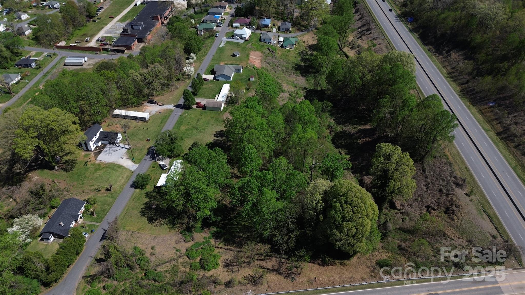 16 Hoyle Street, Unit 16 Marion, NC 28752 - Photo 3 of 5 an aerial view of residential house with outdoor space