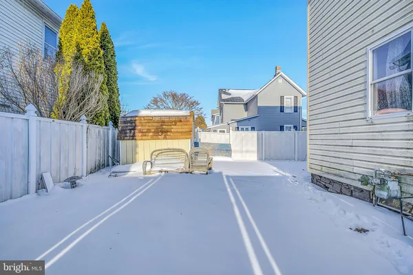 a view of a house with wooden floor and a outdoor space