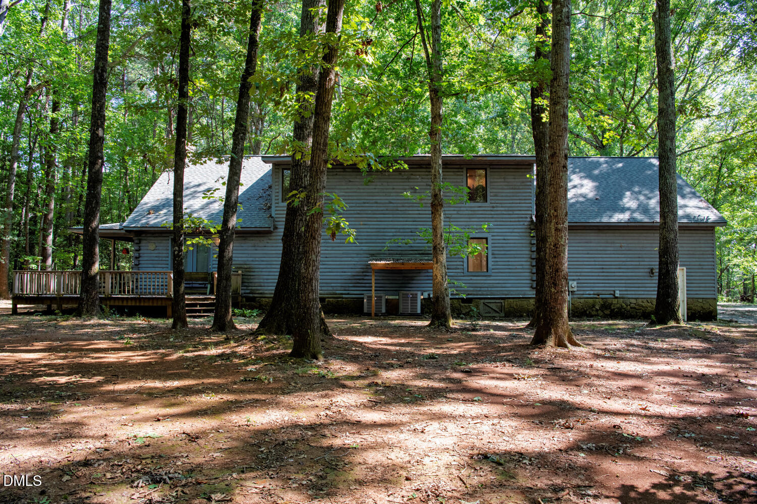 7391 Howerton Road Elon, NC 27244 - Photo 46 of 53 Wooded property with horizontal siding, a multi-level deck, and a shingled roof