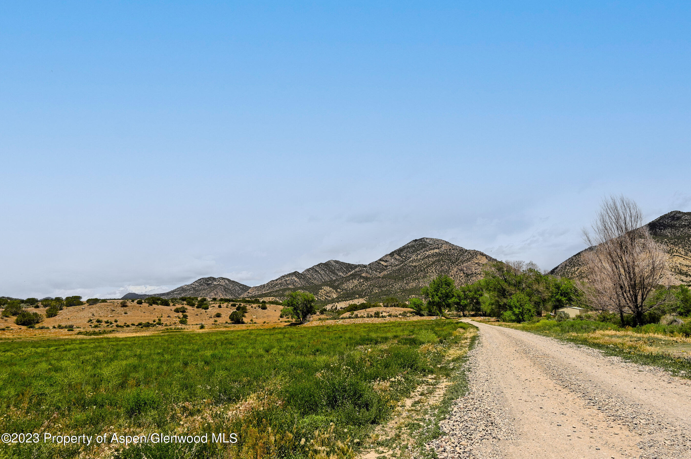 194 Scutter Lane Rifle, CO 81650 - Photo 15 of 32 a view of a town with mountains in the background