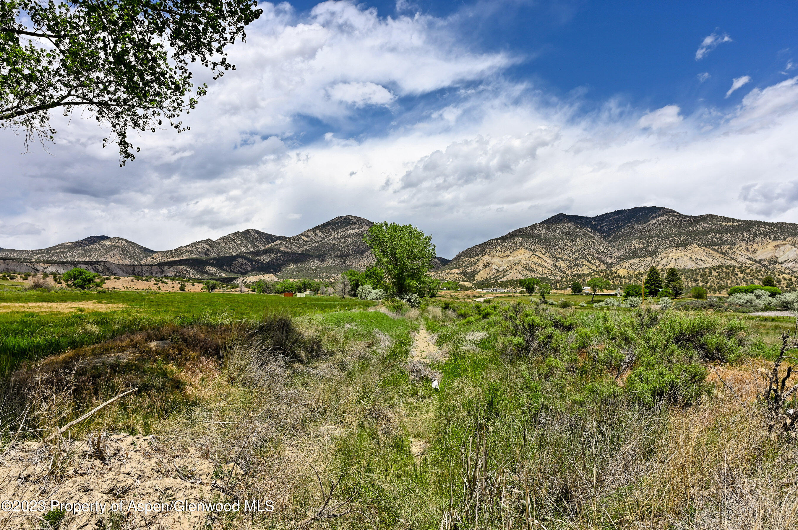 194 Scutter Lane Rifle, CO 81650 - Photo 4 of 32 a view of a lake with a big yard
