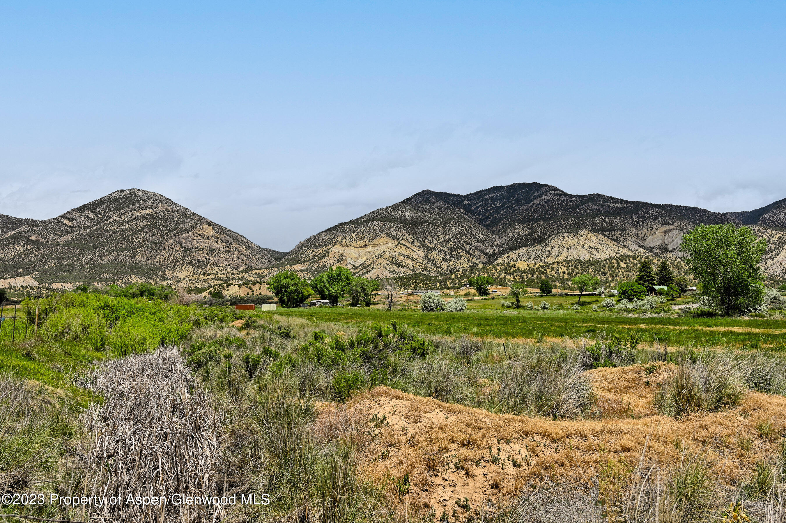 194 Scutter Lane Rifle, CO 81650 - Photo 9 of 32 a view of a town with mountains in the background