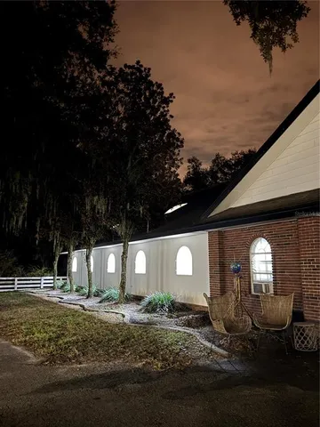 a view of a backyard of the house