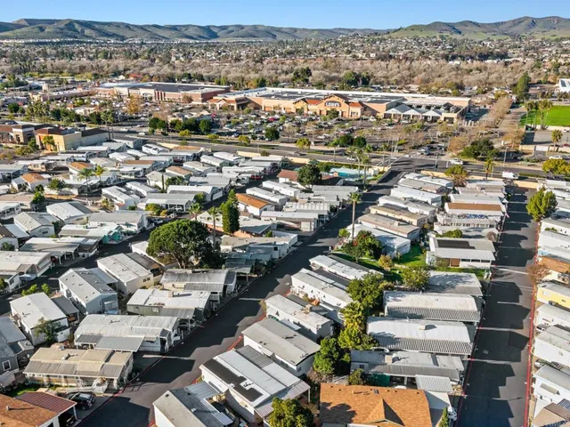 an aerial view of a city with lots of residential buildings