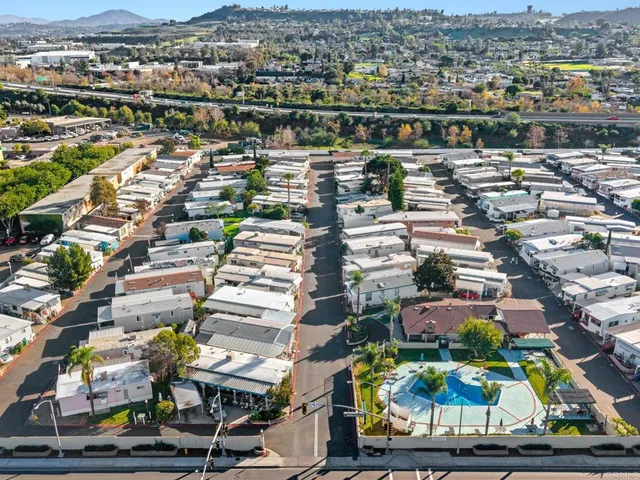 an aerial view of a city with lots of residential buildings