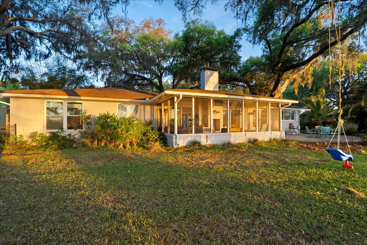 85316 Avant Road Yulee, FL 32097 - Photo 47 of 62 a front view of a house with a yard