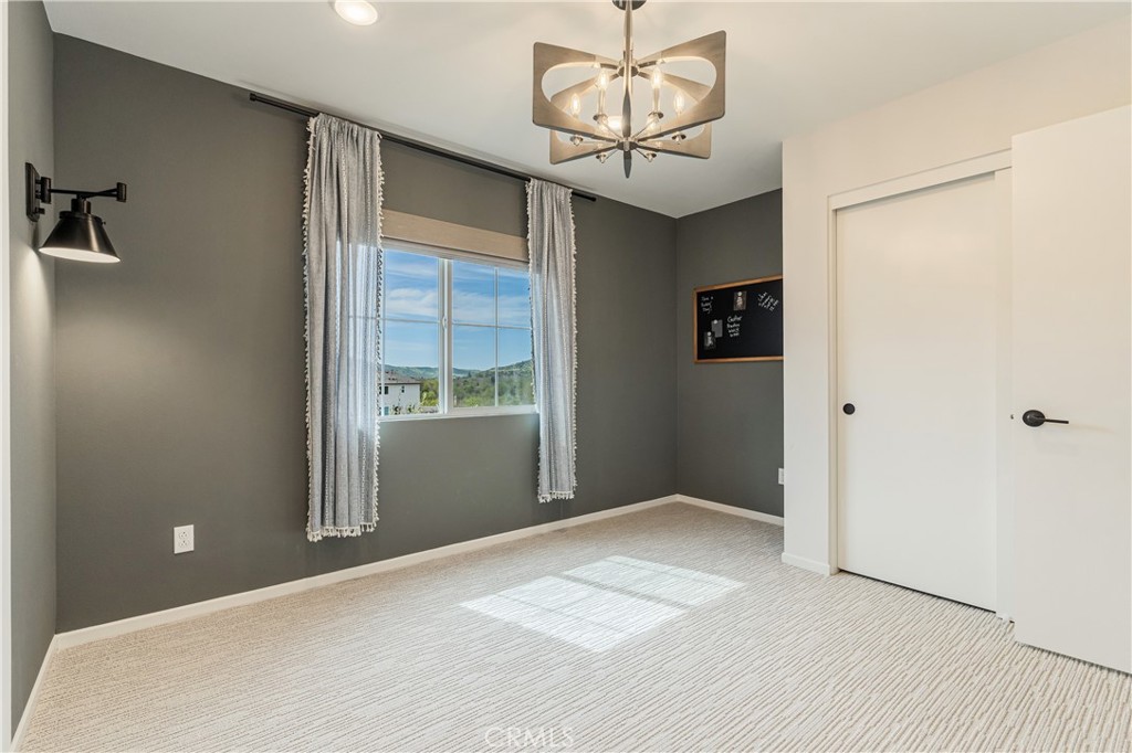 35103 Vintage Cove Fallbrook, CA 92028 - Photo 31 of 66 a view of an empty room with a window