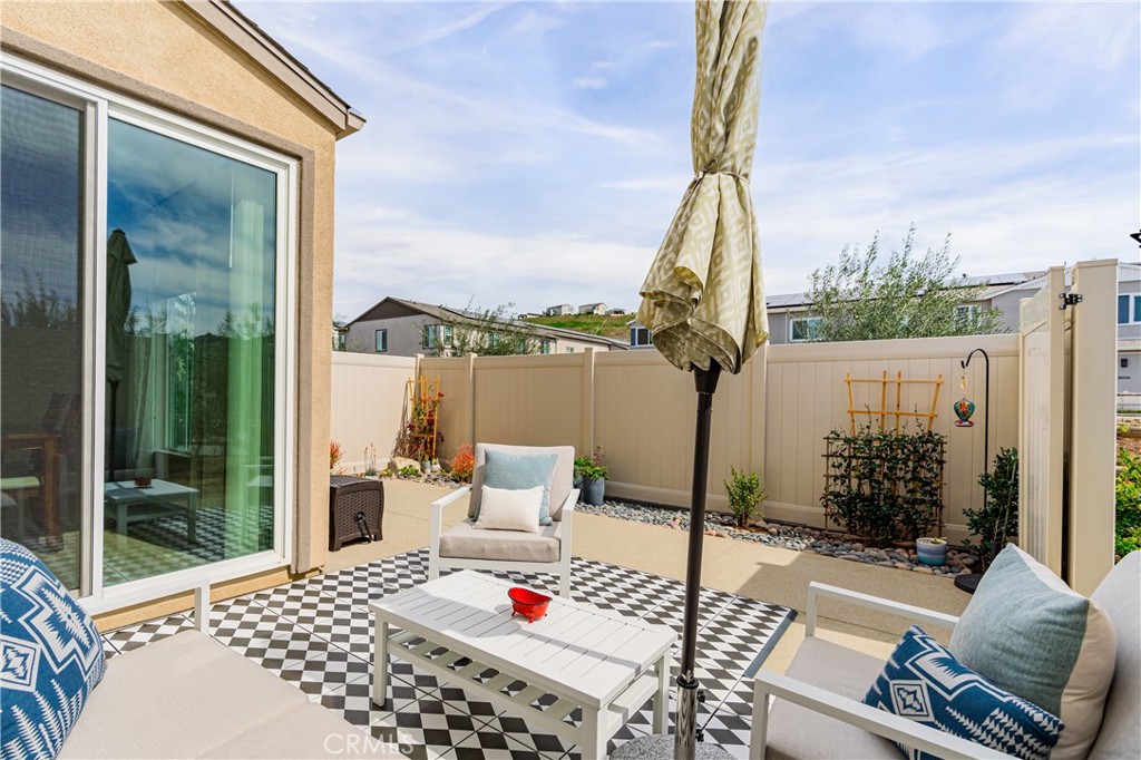 35103 Vintage Cove Fallbrook, CA 92028 - Photo 43 of 66 a view of a patio with couches table and chairs