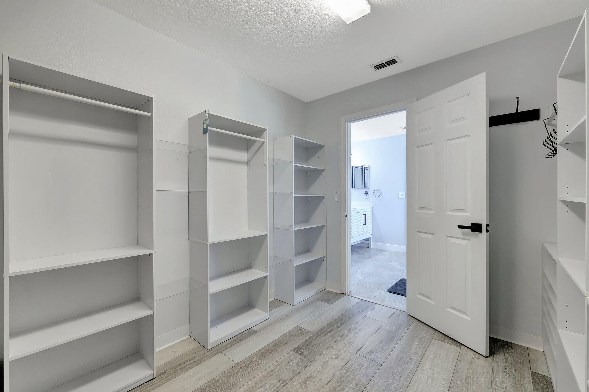 6509 Northwest Omega Road Port St. Lucie, FL 34983 - Photo 31 of 58 Walk In Closet