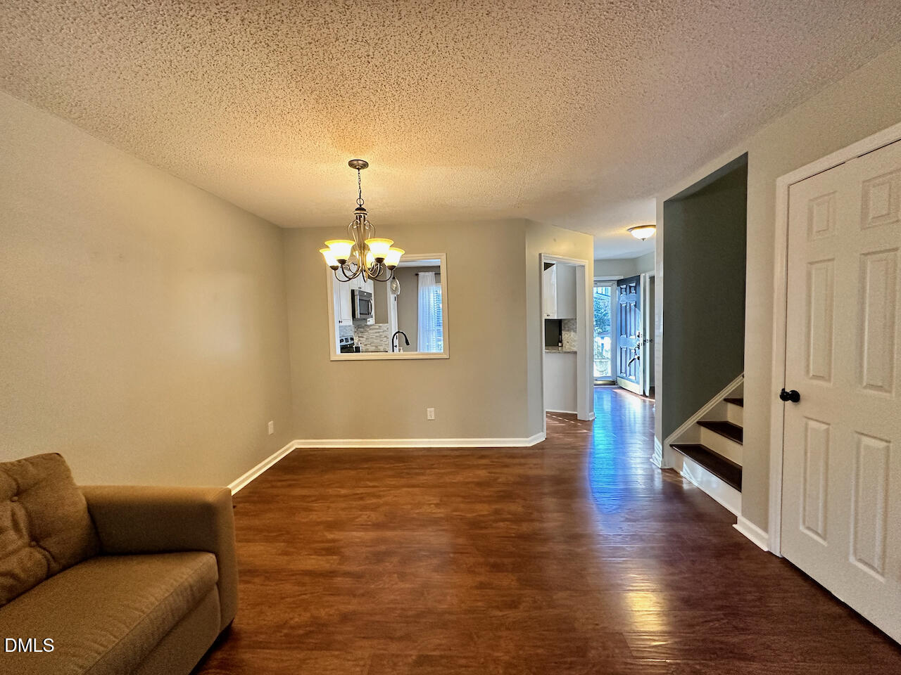 7020 Epping Forest Drive Raleigh, NC 27613 - Photo 8 of 24 a living room with furniture and a wooden floor